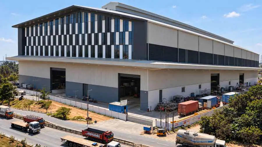 Modern PEB warehouse with striped glazed facade